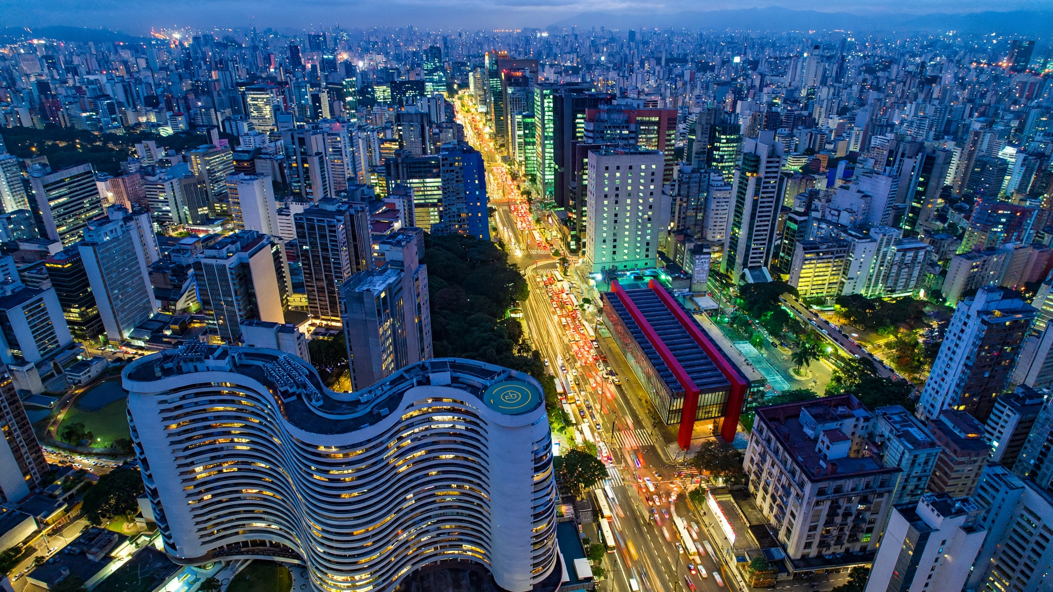 São Paulo skyline over Avenida Paulista with Copan and MASP at dusk