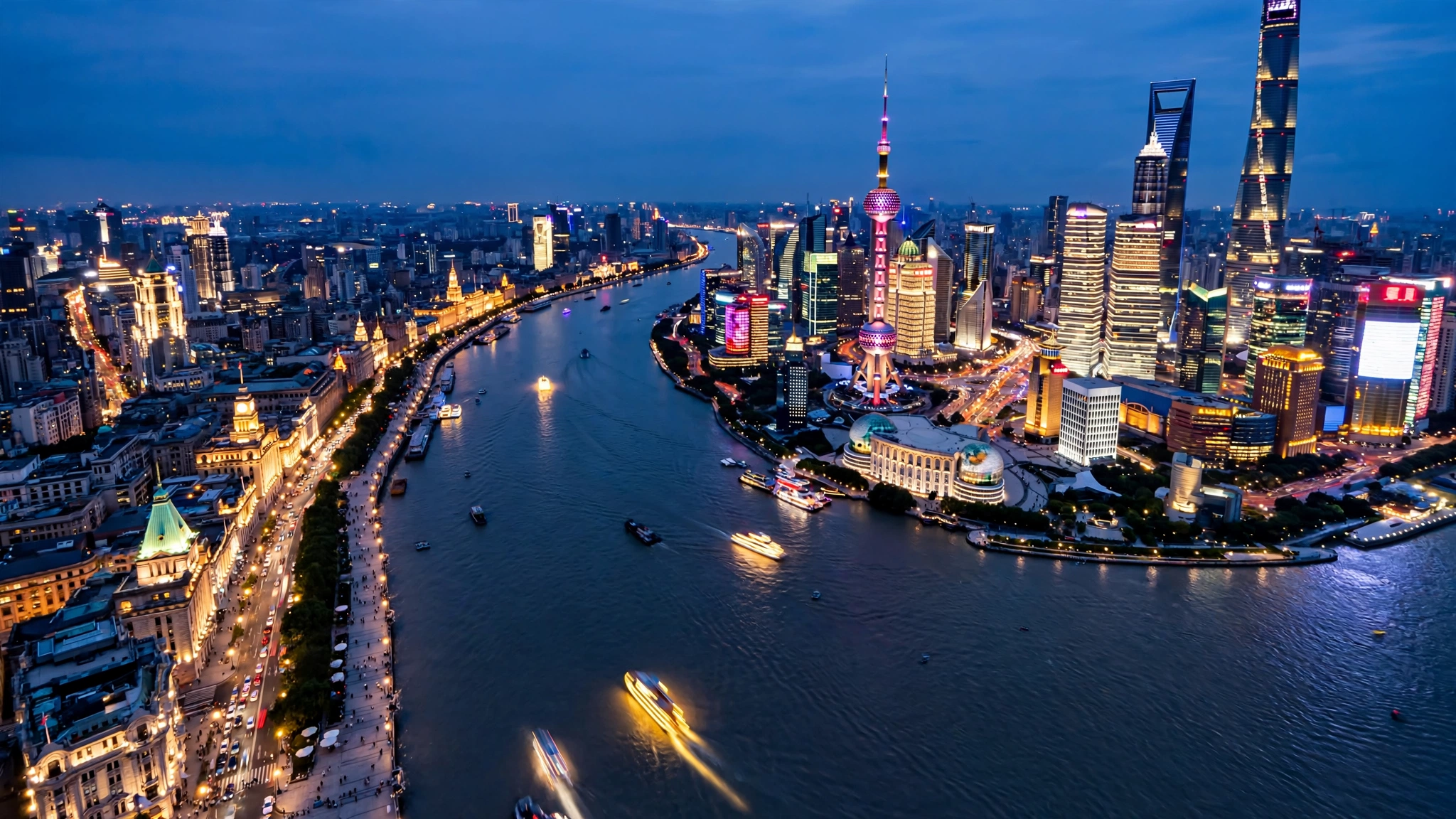 Shanghai skyline over the Huangpu River and Lujiazui at blue hour