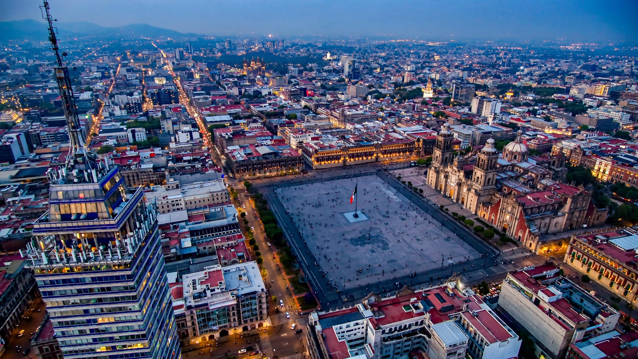 Mexico City Zócalo with cathedral and National Palace at blue hour